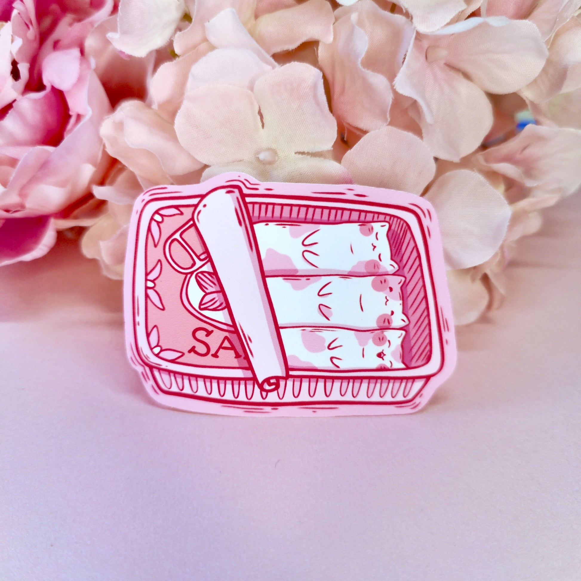 Matte vinyl die-cut sticker featuring three cute cats inside a sardine tin – Sardine Kitties kawaii-style artwork, printed in Ireland, 8x5.5cm