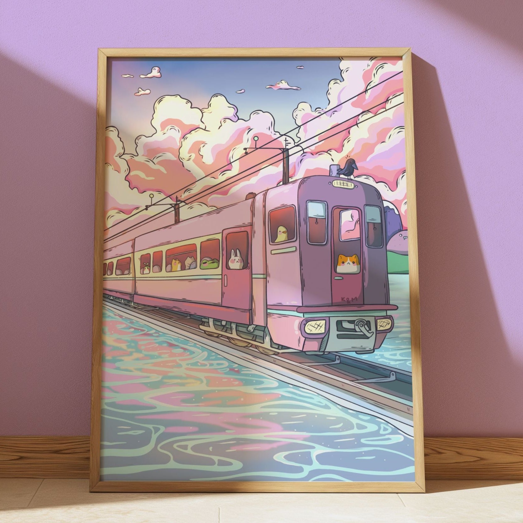 Framed illustration of a colourful train on a pink wall ghibli art train kawaii animals
