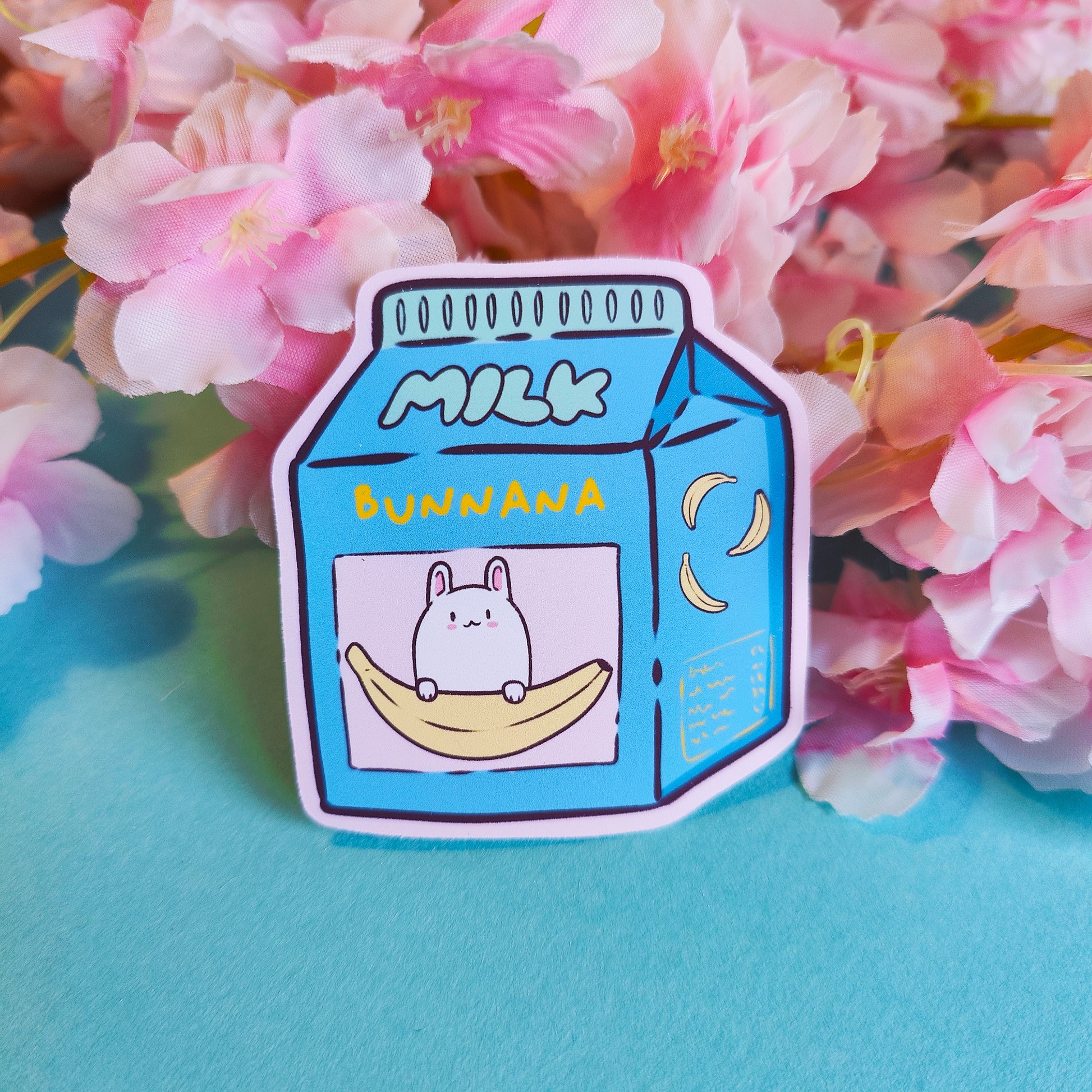 Matte vinyl die-cut sticker featuring Bunnana – a kawaii banana milk carton with a cute bunny character, printed in Ireland, 6x6.5cm