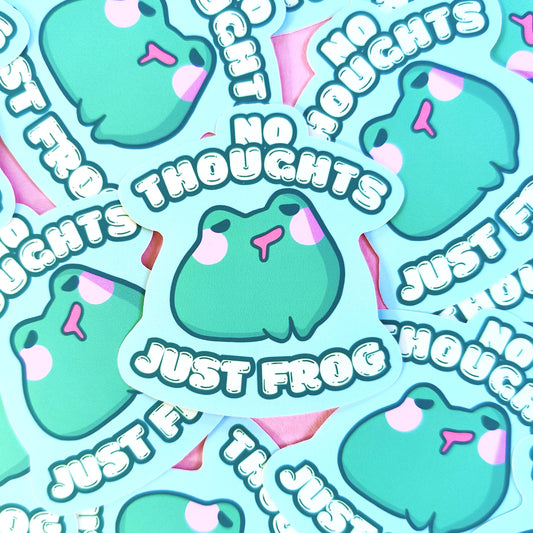 Matte vinyl die-cut sticker featuring No Thoughts Just Frog – a blank-faced, kawaii frog character, printed in Ireland, 5x7cm