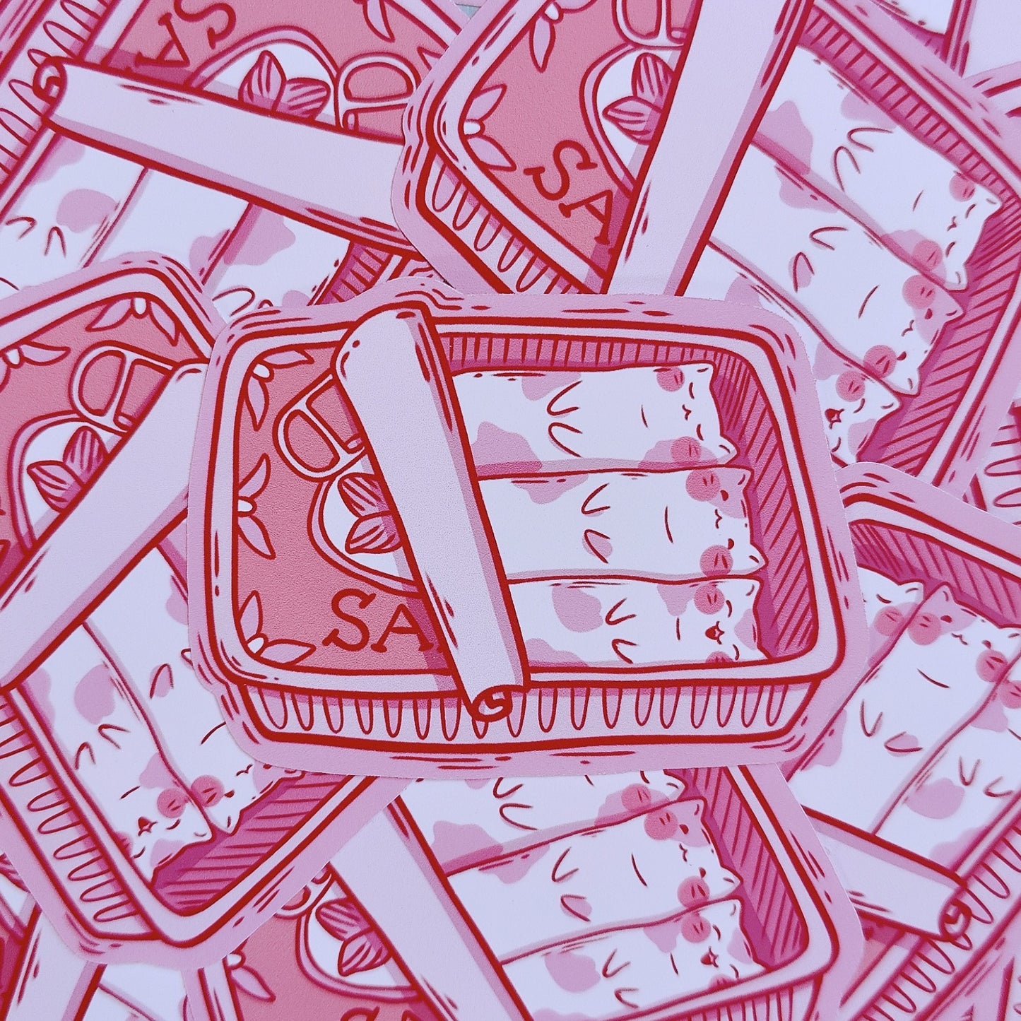 Matte vinyl die-cut sticker featuring three cute cats inside a sardine tin – Sardine Kitties kawaii-style artwork, printed in Ireland, 8x5.5cm