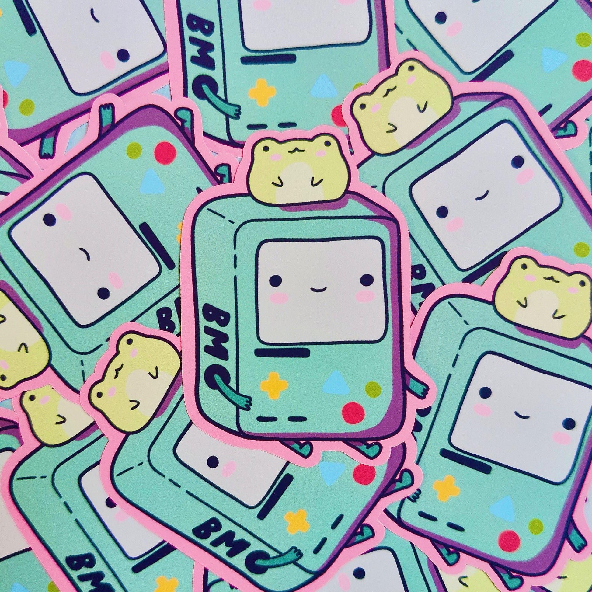 Matte vinyl die-cut sticker featuring a kawaii BMO-inspired character with a frog on his head, printed in Ireland, 5x7cm