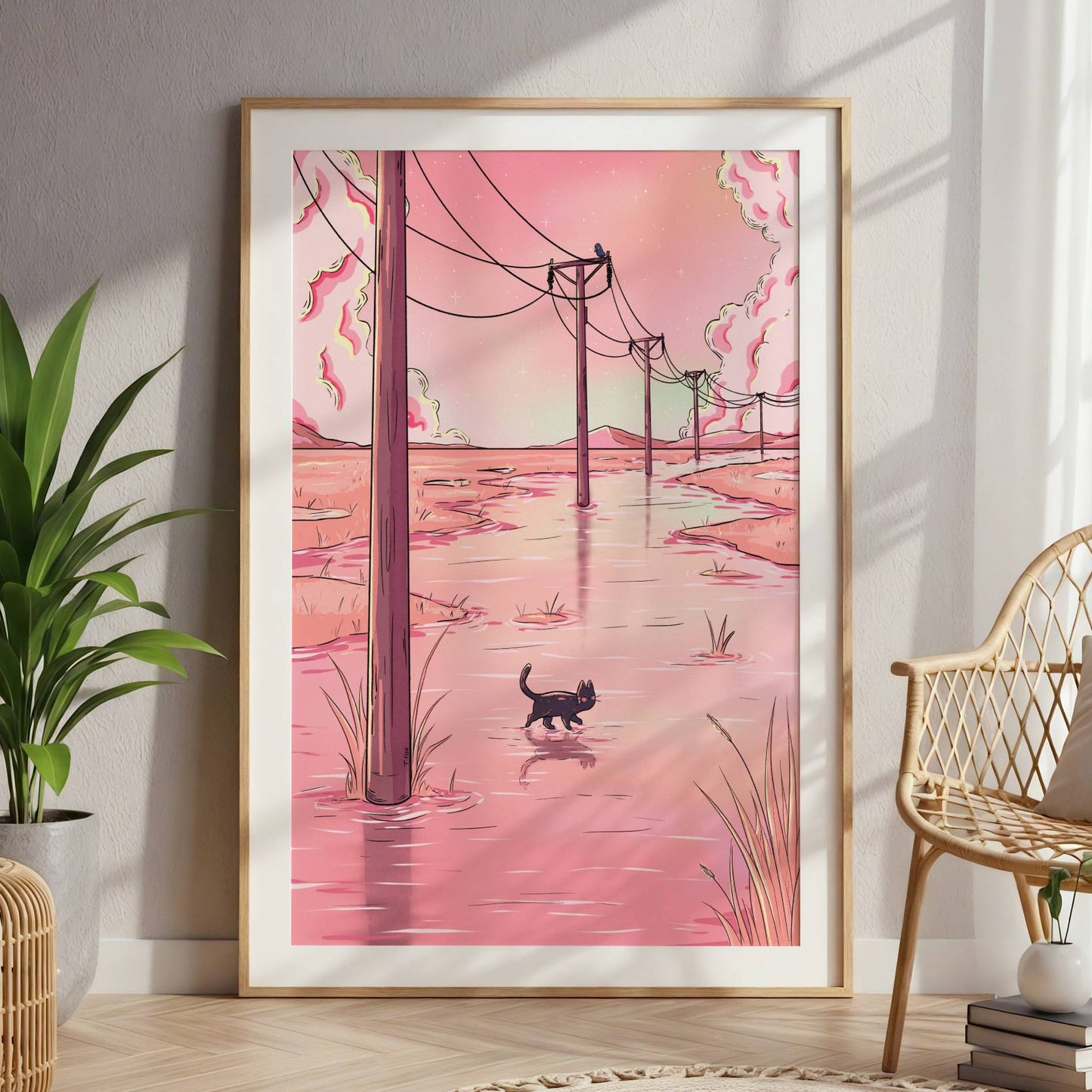 Framed artwork of a cat walking along a flooded street with power lines in a room with a plant and chair.